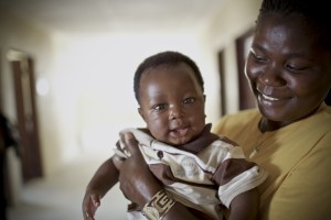 Ansu, 3 months old, and his mother Emily at the Save the Children